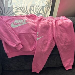 Nike Kids Pink Sweatpants and Hoodie Set.